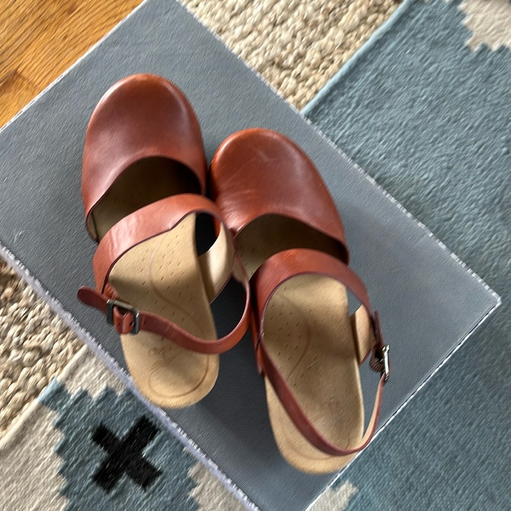 Brown leather wedge or closed toe sandals by Dansko
